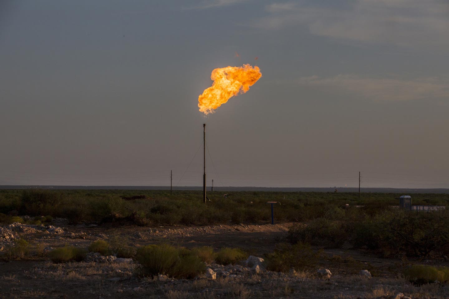 A gas flare near Mentone, Texas. Gas often comes up from reservoirs along with oil. Where there isn’t enough of the fuel to exploit commercially, drillers often vent it directly into the air or burn it off at the wellhead. 